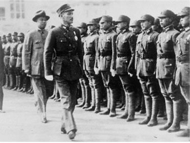 Nationalist Commander Chiang Kai-shek reviewing cadets in the late 1920s